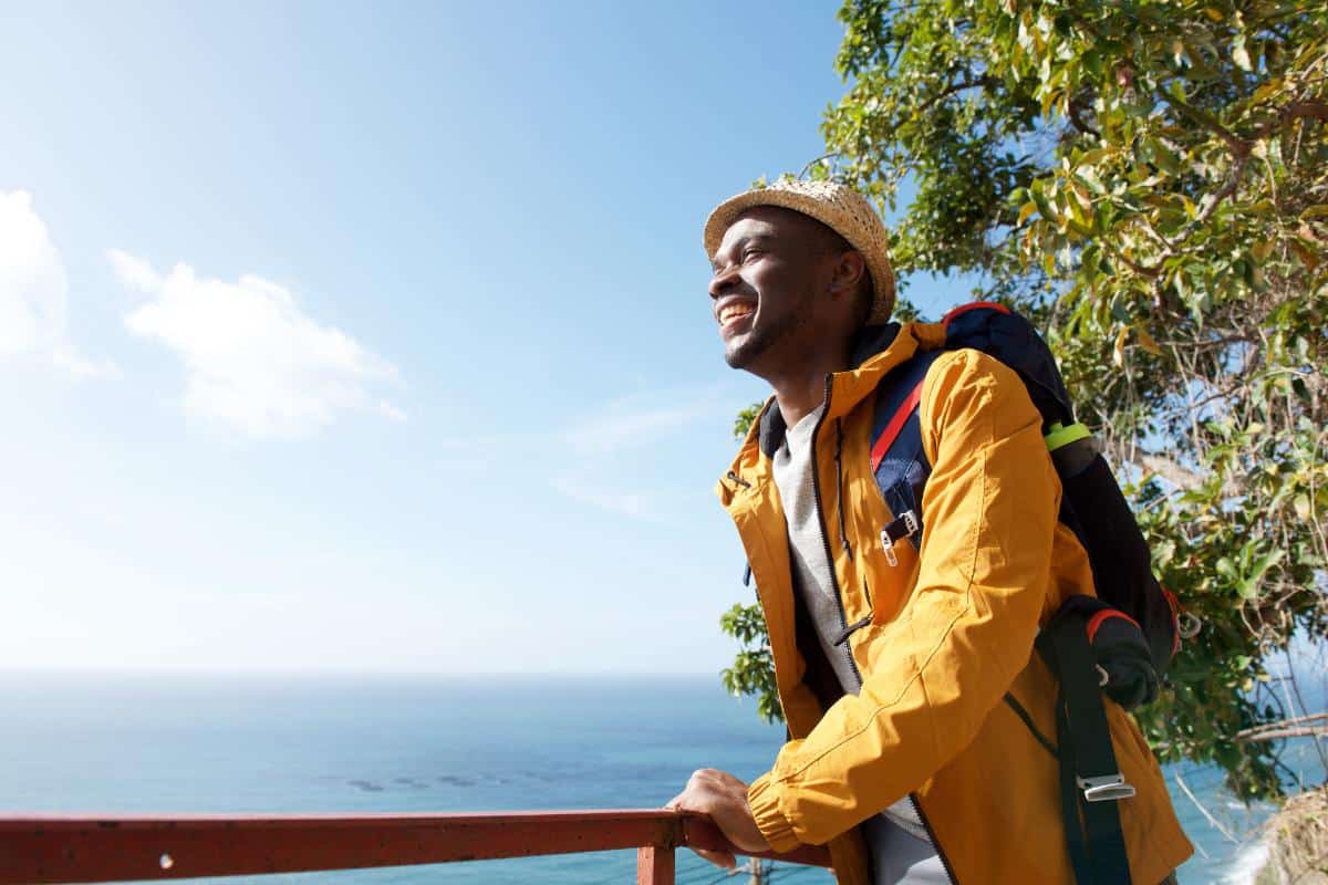 man outside enjoying mental health goals